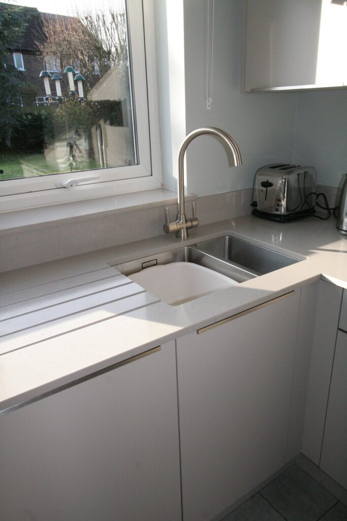 Diffuse TT in Cashmere, with utility — a Stoneham kitchen by Kitchensmiths, with silestone Royal Reef worktops (photograph 3 of 8)