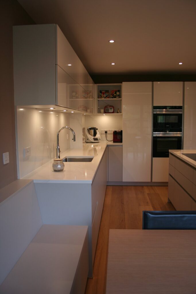 Silky Beige matt and Snow White gloss — a Störmer kitchen by Kitchensmiths, with silestone Calacutta Gold worktops (photograph 4 of 8)