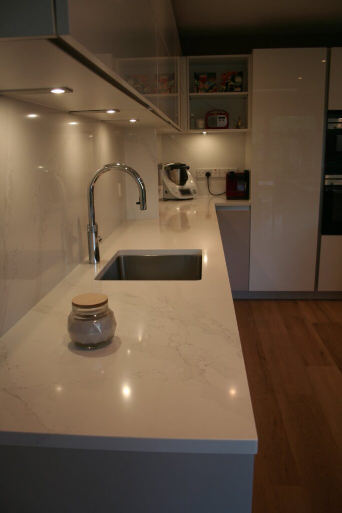 Silky Beige matt and Snow White gloss — a Störmer kitchen by Kitchensmiths, with silestone Calacutta Gold worktops (photograph 8 of 8)