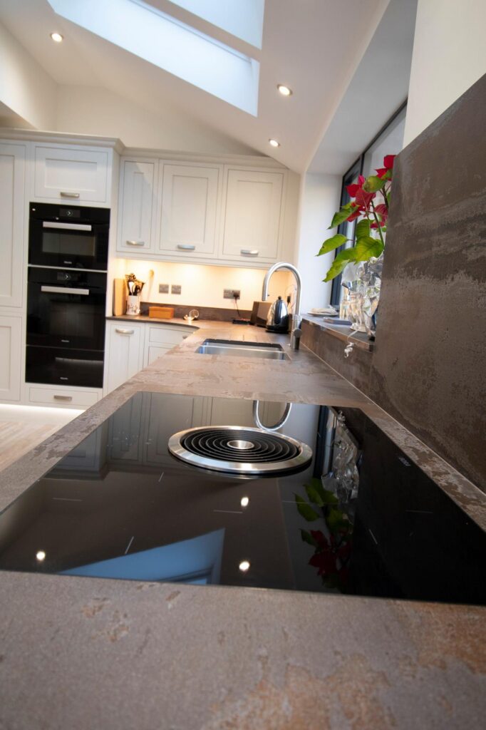 Ightham FF in Mussel Enhanced Grain — a Stoneham kitchen by Kitchensmiths, with dekton Trilium worktops (photograph 1 of 6)