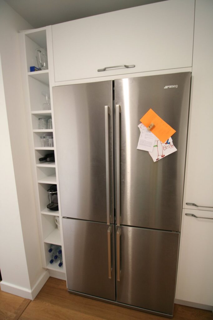Porcelain White, with a traditional nod — a Rational kitchen by Kitchensmiths, with oak worktops (photograph 8 of 8)