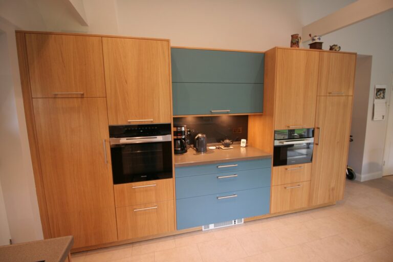 Bookmatched light oak and matt teal
