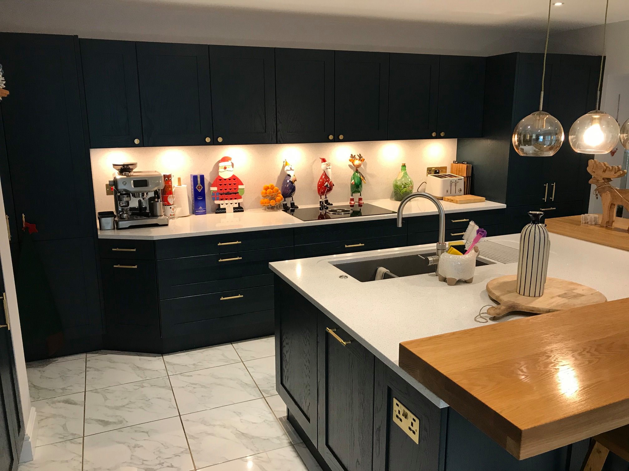 Blue Hague painted oak, and handmade brass — a Stoneham kitchen by Kitchensmiths (photograph 2 of 5)
