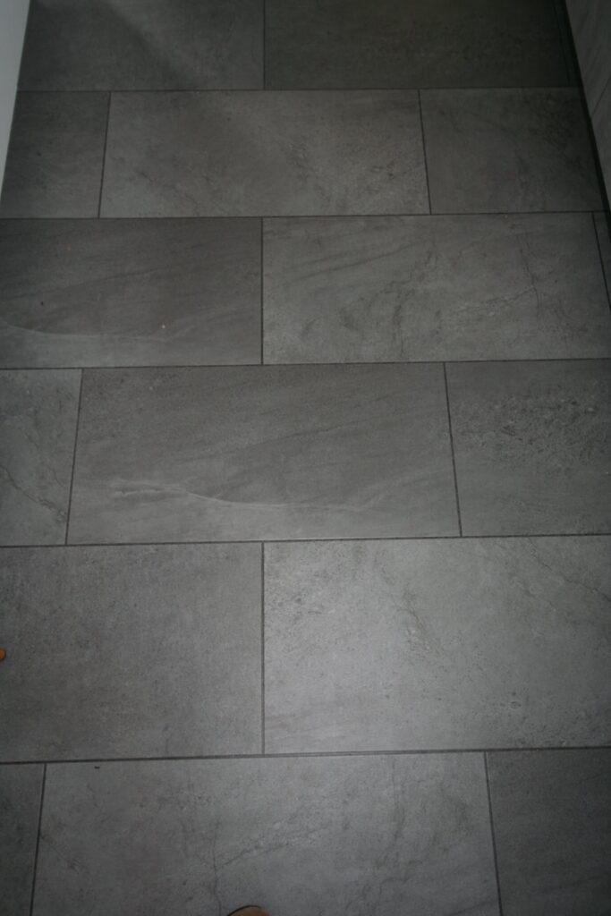 Concrete Grey, and an island that does both jobs — a Rational kitchen by Kitchensmiths (photograph 4 of 4)