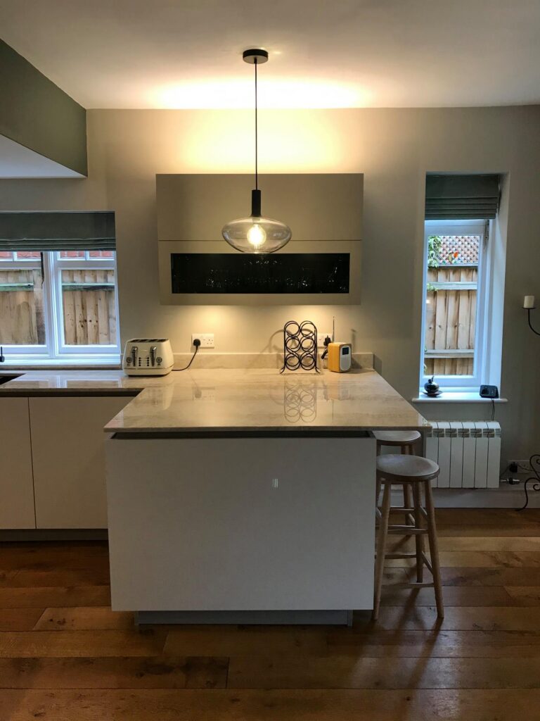 Fenix fronts and Taj Mahal stone — a BAX kitchen by Kitchensmiths, with sensa Taj Mahal worktops (photograph 1 of 7)