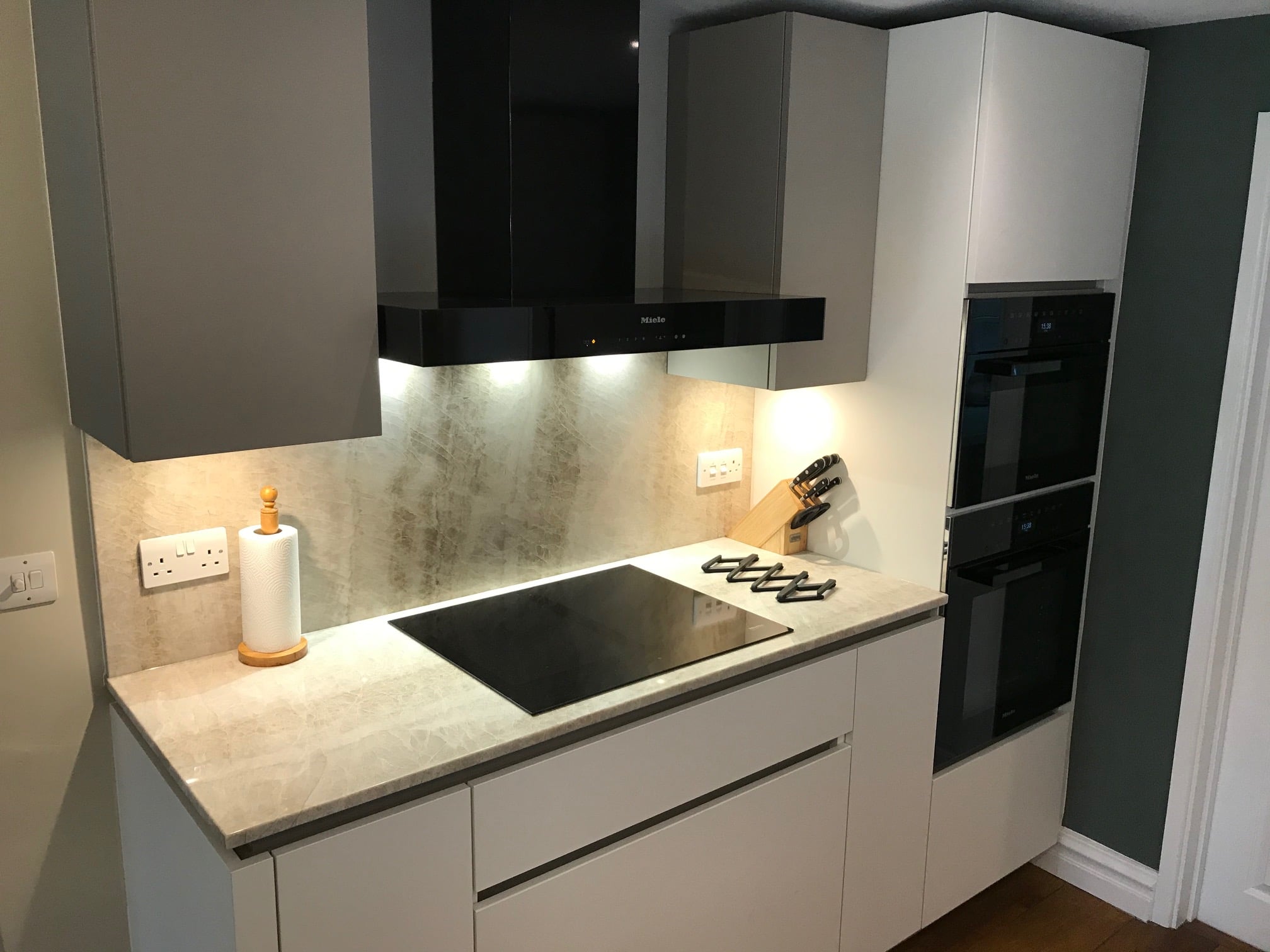Fenix fronts and Taj Mahal stone — a BAX kitchen by Kitchensmiths, with sensa Taj Mahal worktops (photograph 4 of 7)