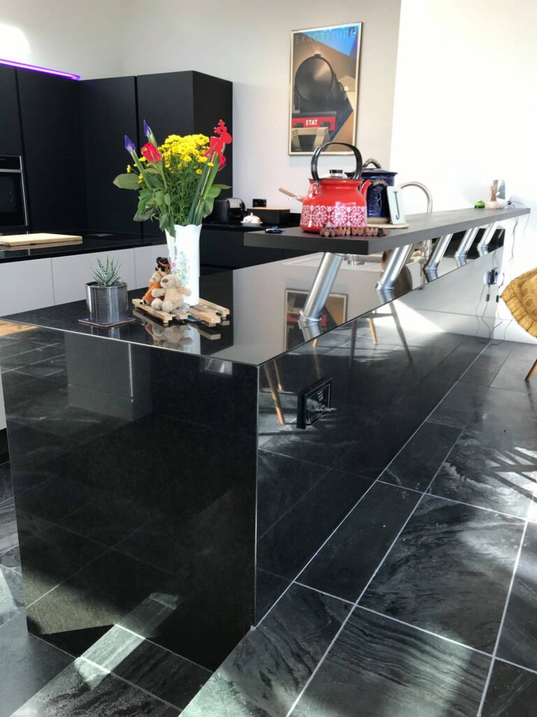 Back to black — a BAX kitchen by Kitchensmiths, with granite worktops (photograph 1 of 9)