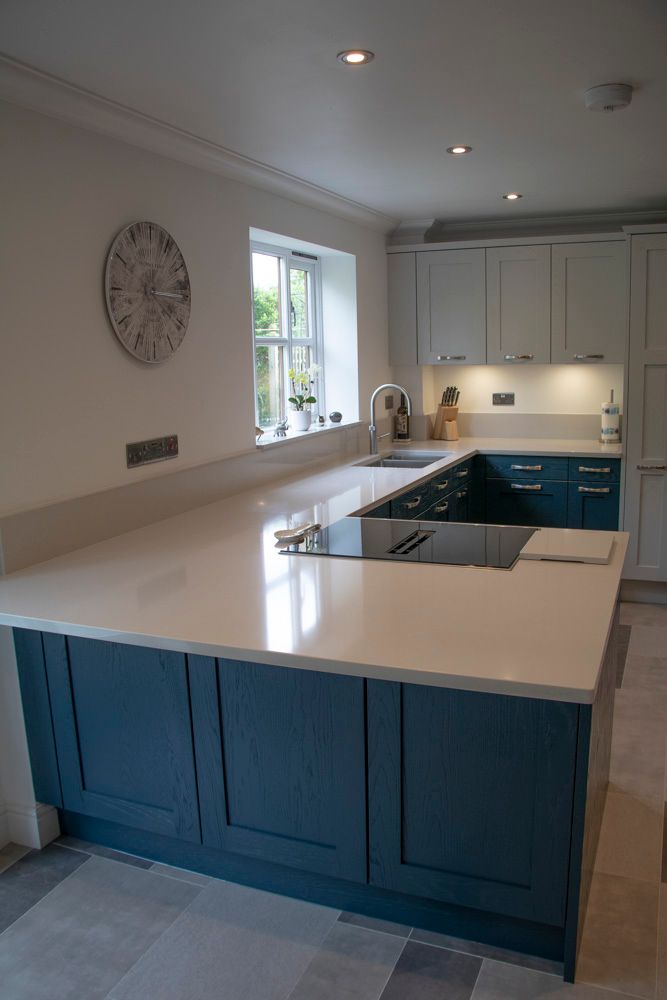 Hague Blue and Dove Grey, painted oak — a Stoneham kitchen by Kitchensmiths, with silestone worktops (photograph 1 of 6)
