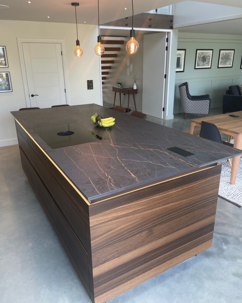 TIO handleless in a bespoke Cambridge build — a Rational kitchen by Kitchensmiths, with dekton Laurent worktops (photograph 2 of 6)