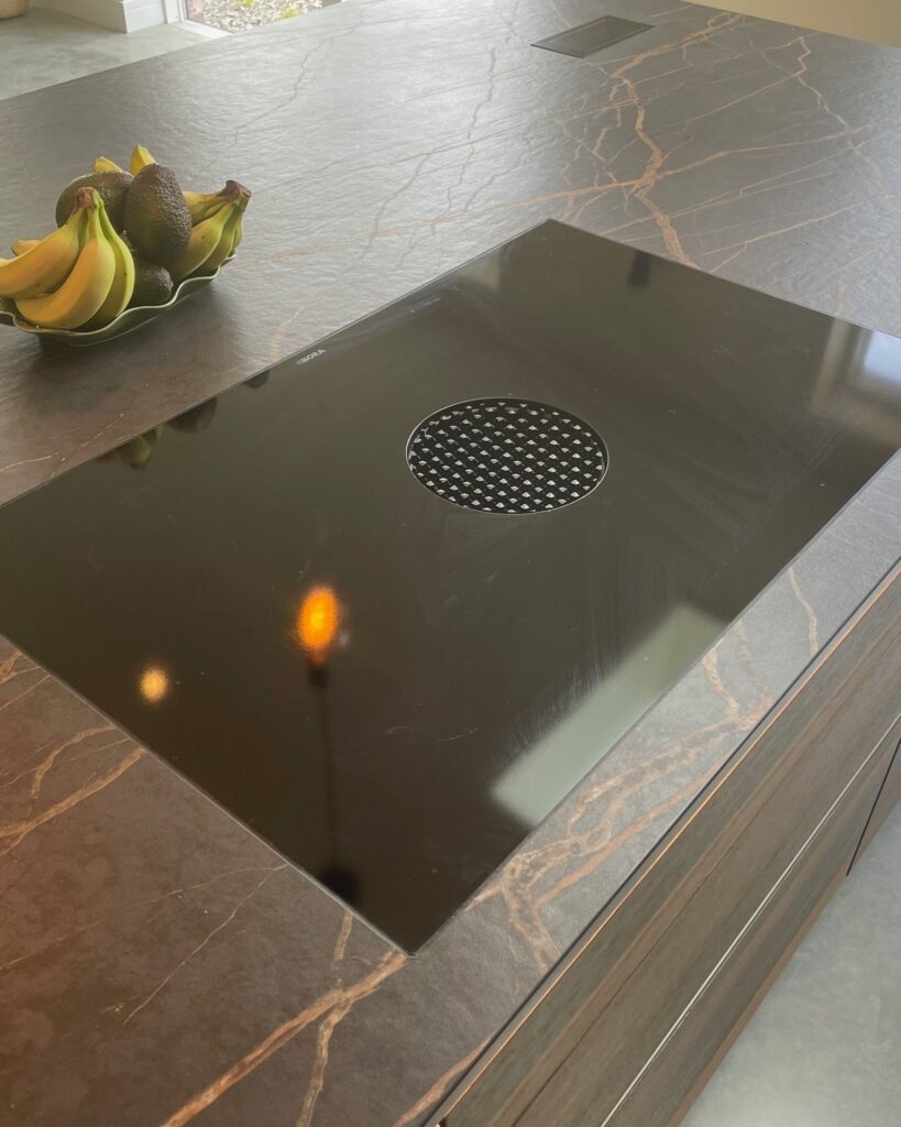 TIO handleless in a bespoke Cambridge build — a Rational kitchen by Kitchensmiths, with dekton Laurent worktops (photograph 6 of 6)