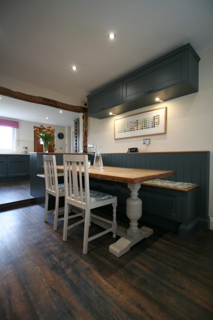 Thunder Grey in a cottage kitchen — a Stoneham kitchen by Kitchensmiths, with silestone Crema Marfil worktops (photograph 2 of 6)