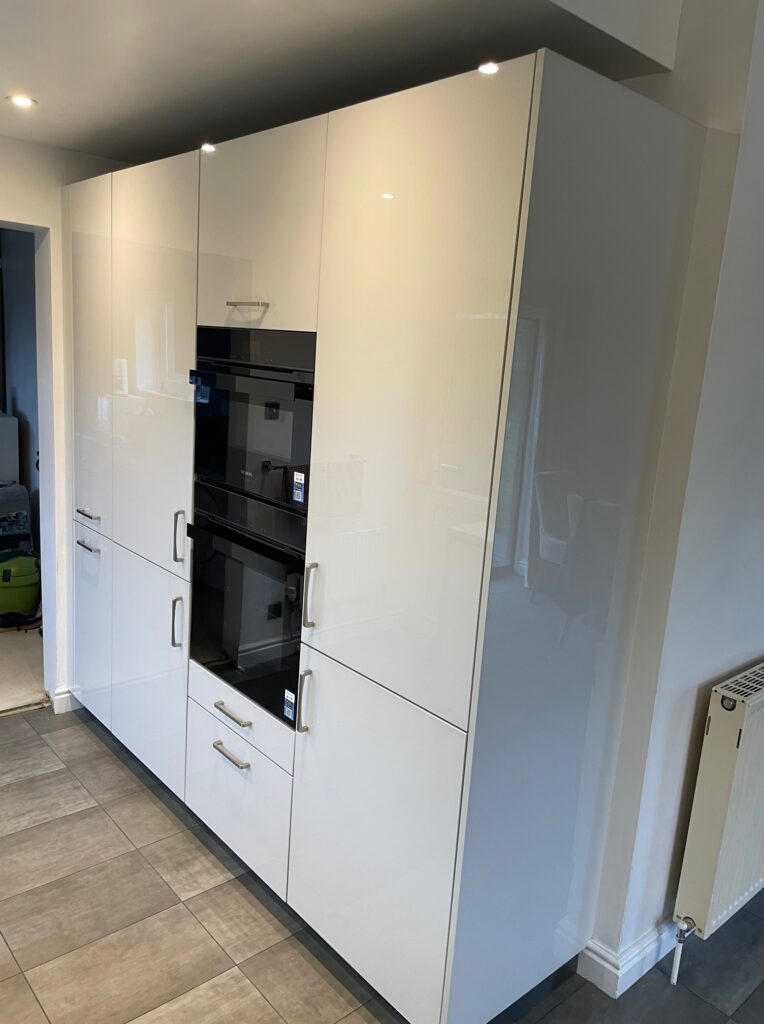 Matt and gloss, both — a Sachsenküchen kitchen by Kitchensmiths, with dekton Grigio worktops (photograph 2 of 6)