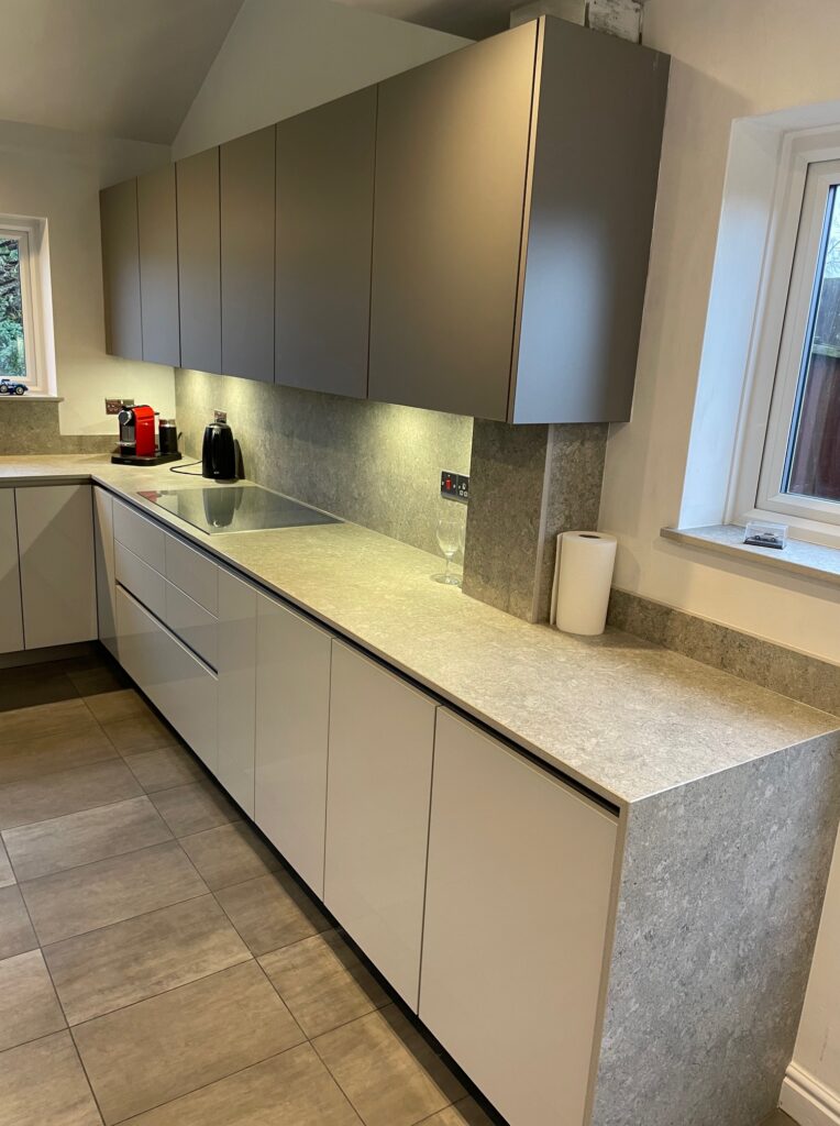Matt and gloss, both — a Sachsenküchen kitchen by Kitchensmiths, with dekton Grigio worktops (photograph 3 of 6)