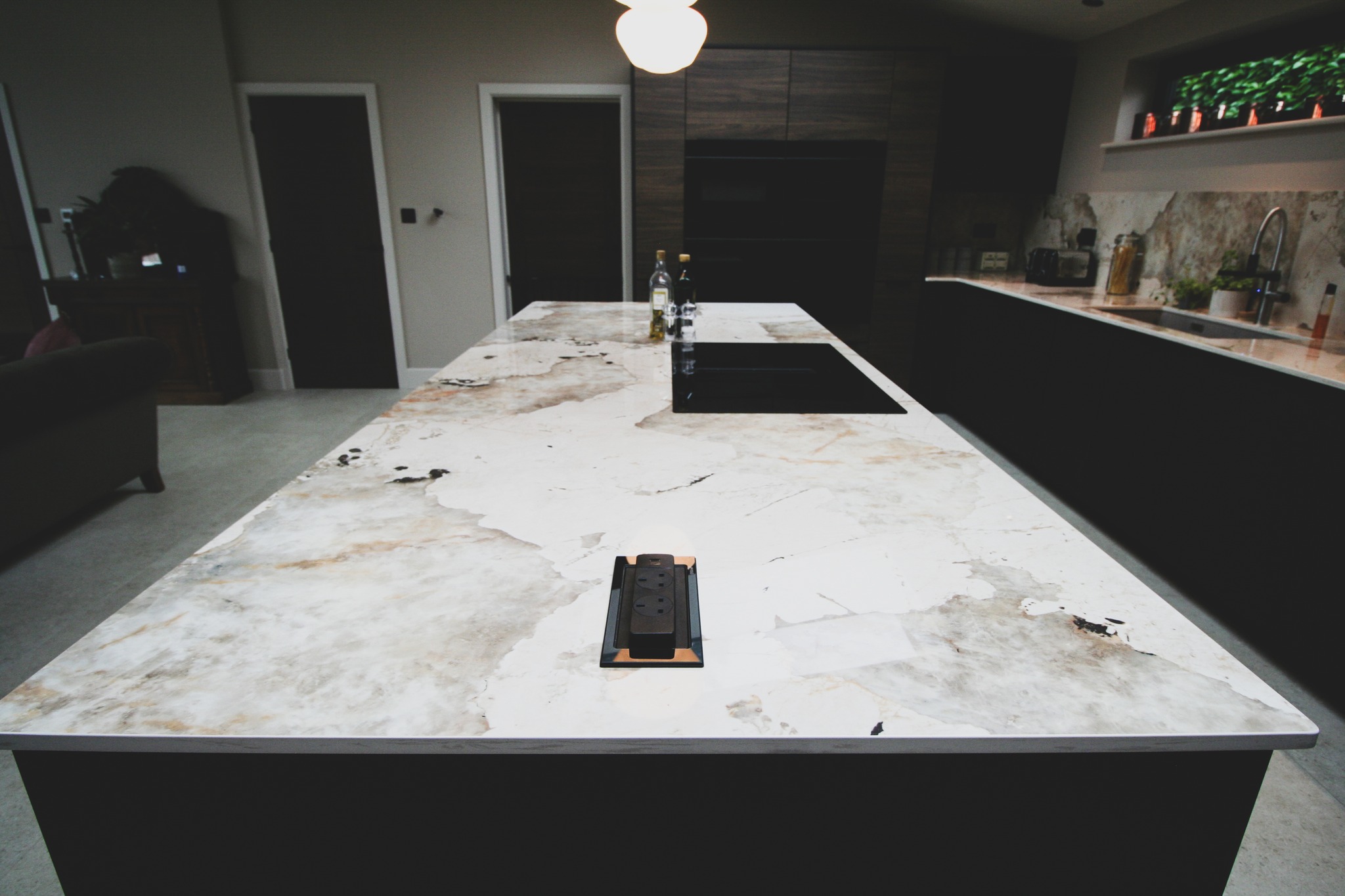 Walnut and black super-matt — a kitchen by Kitchensmiths, with dekton Khalo worktops (photograph 4 of 10)