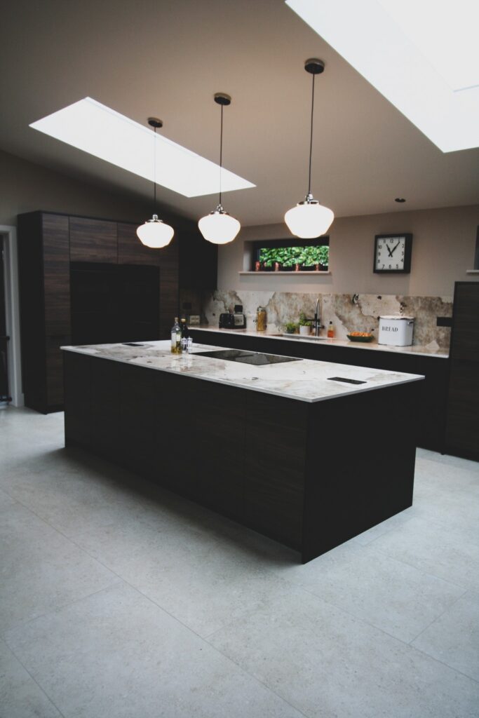 Walnut and black super-matt — a kitchen by Kitchensmiths, with dekton Khalo worktops (photograph 5 of 10)