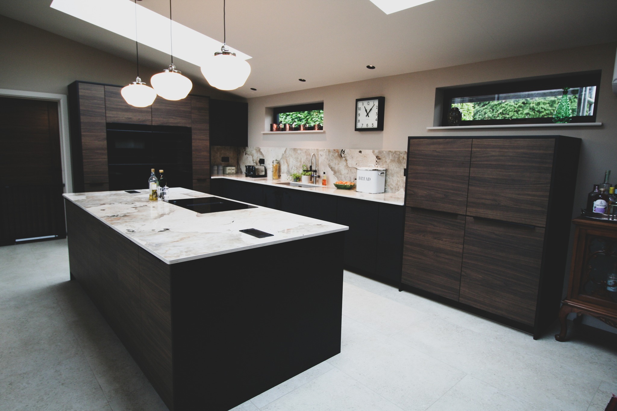 Walnut and black super-matt — a kitchen by Kitchensmiths, with dekton Khalo worktops (photograph 8 of 10)