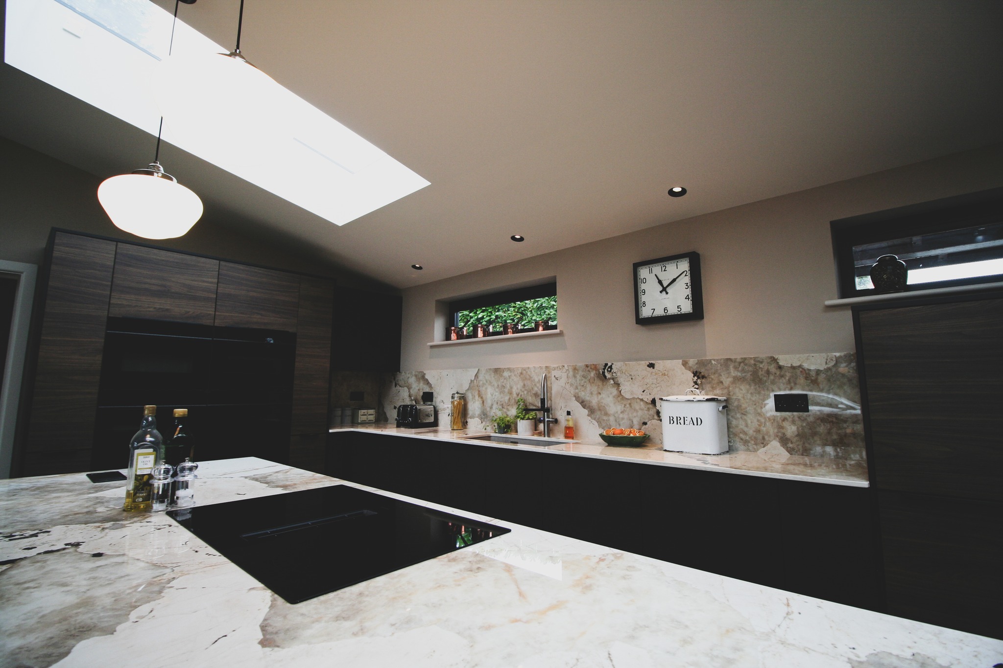 Walnut and black super-matt — a kitchen by Kitchensmiths, with dekton Khalo worktops (photograph 9 of 10)
