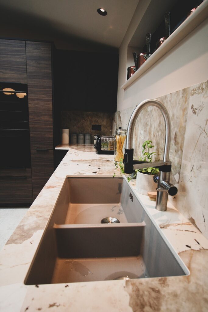 Walnut and black super-matt — a kitchen by Kitchensmiths, with dekton Khalo worktops (photograph 10 of 10)