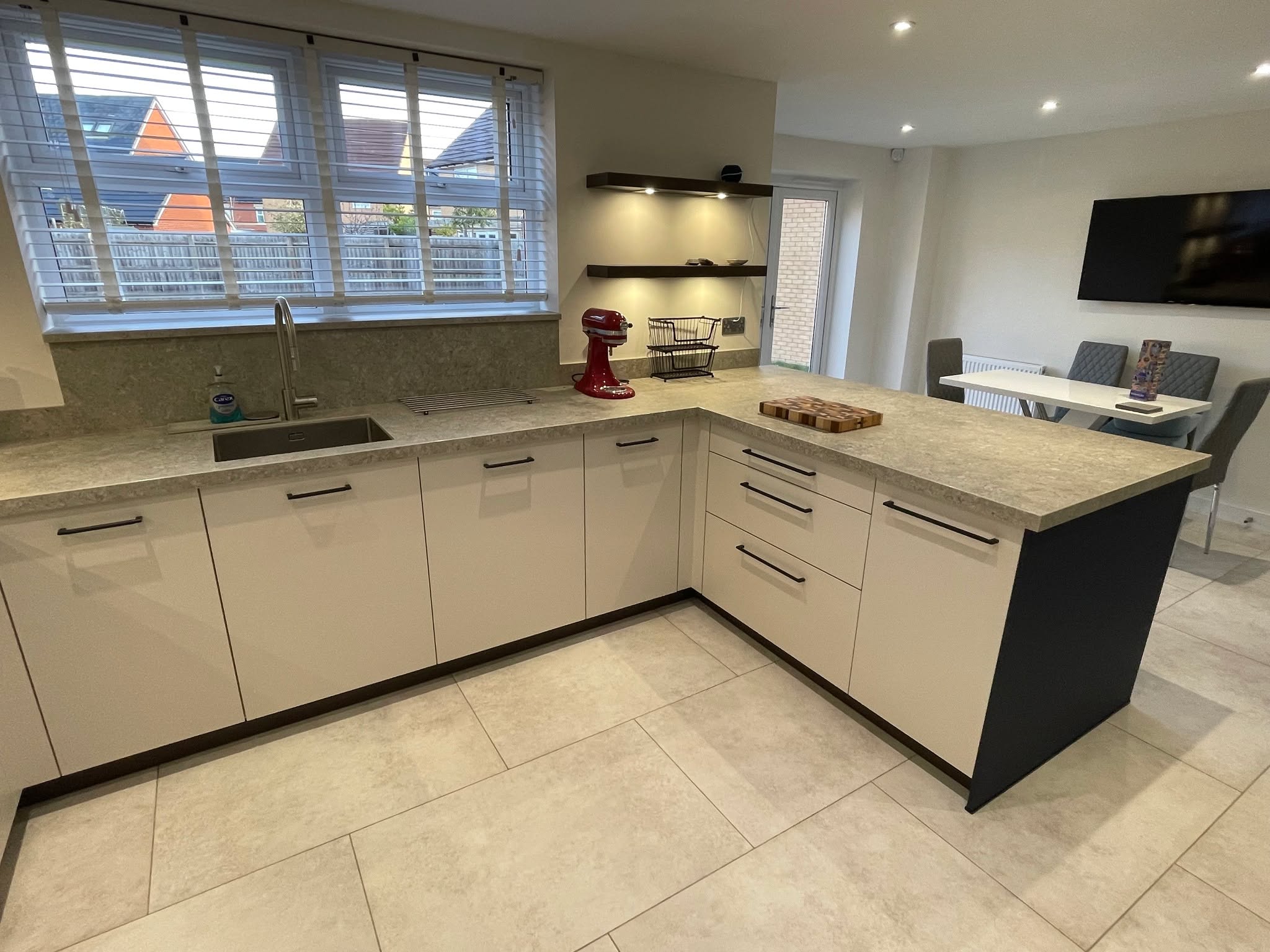 Kitchen and utility, understated — a Sachsenküchen kitchen by Kitchensmiths, with dekton Grigio worktops (photograph 3 of 7)
