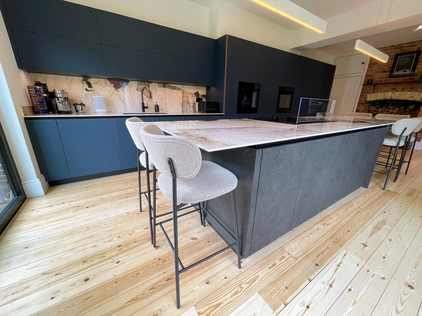 Real walnut, quietly done — a Sachsenküchen kitchen by Kitchensmiths (photograph 4 of 5)
