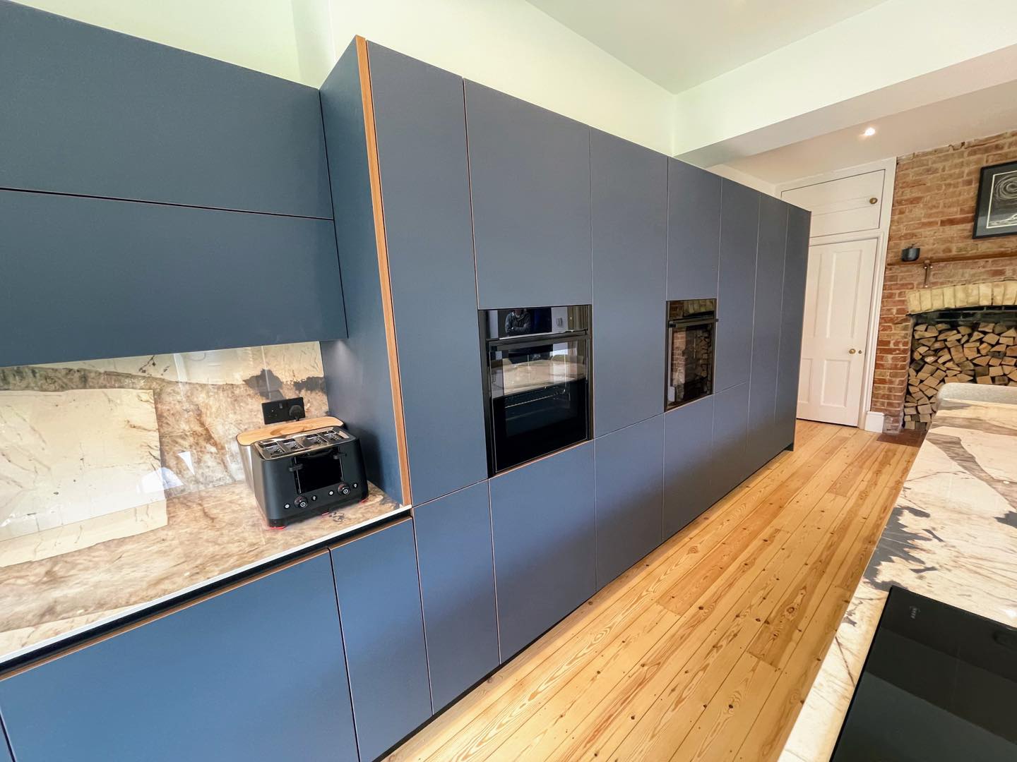 Real walnut, quietly done — a Sachsenküchen kitchen by Kitchensmiths (photograph 5 of 5)