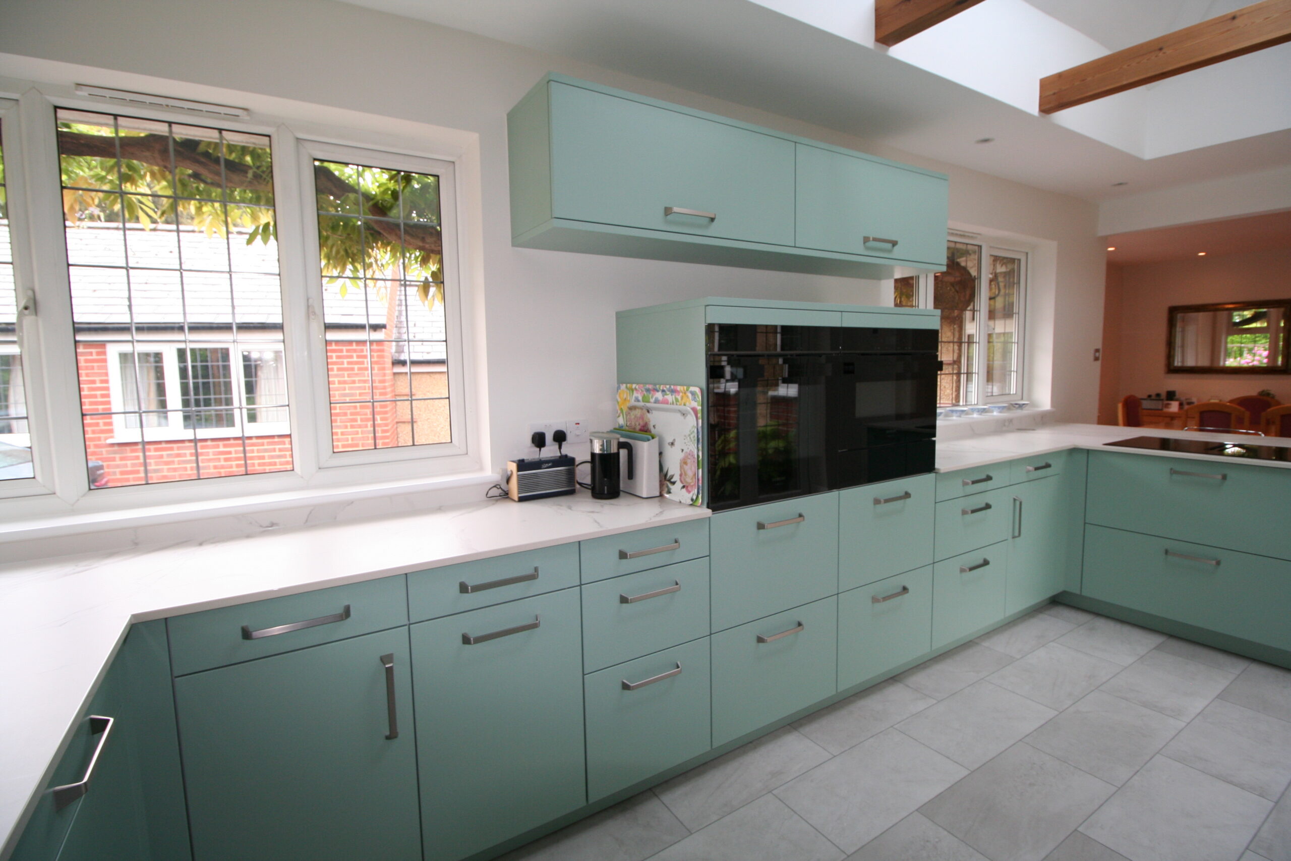 Senta in duck egg, under Dekton Aura — a Sachsenküchen kitchen by Kitchensmiths, with dekton Aura worktops (photograph 5 of 5)