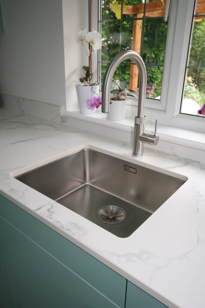 Senta in duck egg, under Dekton Aura — a Sachsenküchen kitchen by Kitchensmiths, with dekton Aura worktops (photograph 3 of 5)