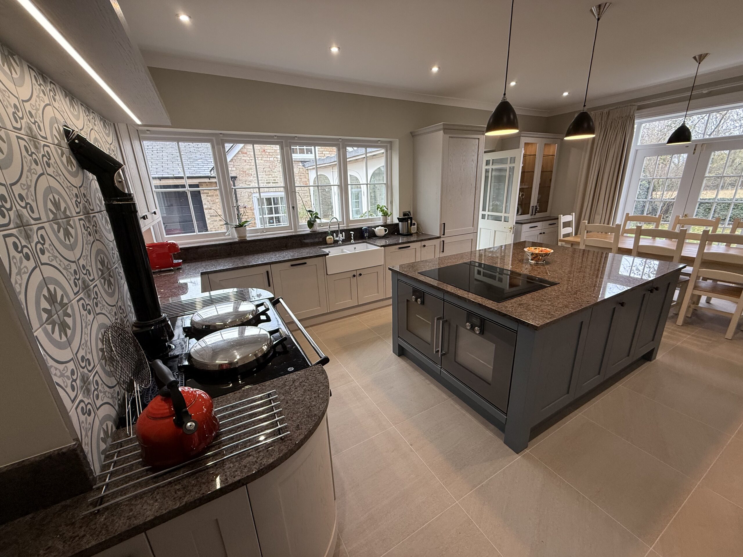 Cashmere and Aegean Blue, under Antique Labrador — a Stoneham kitchen by Kitchensmiths