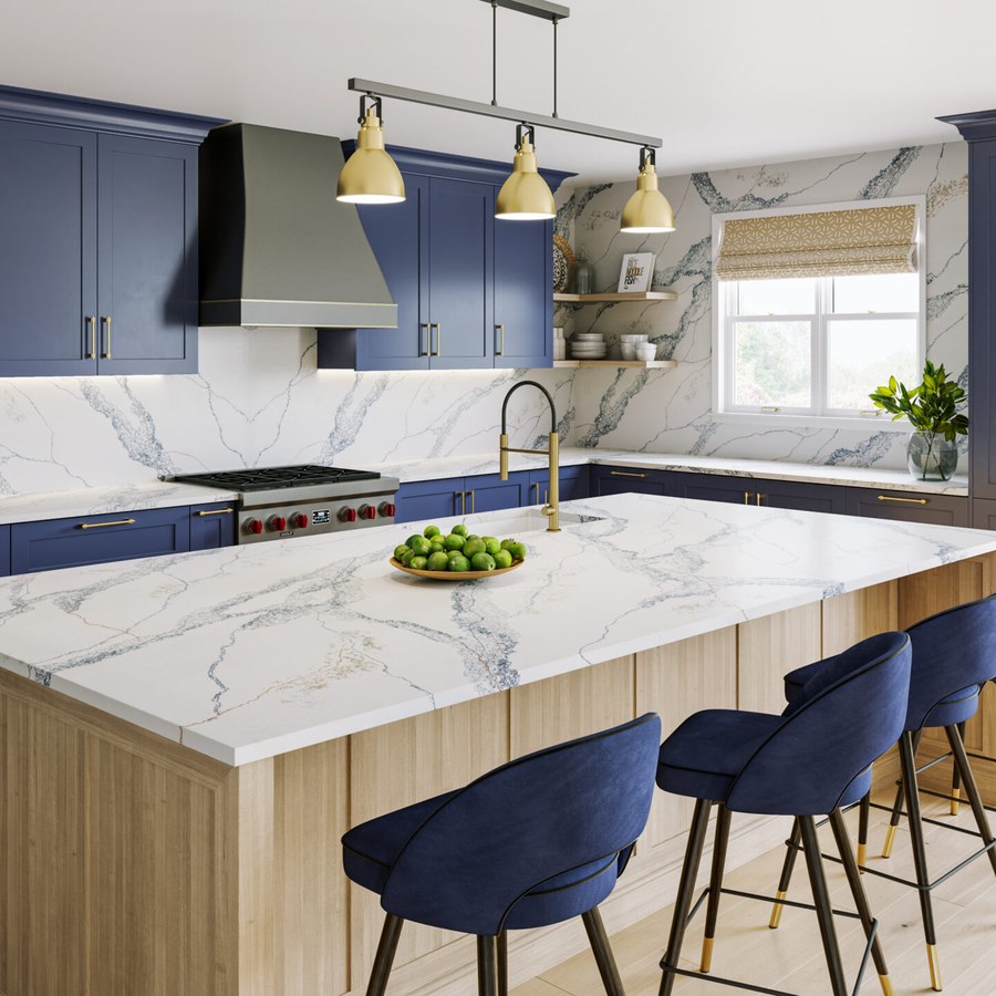 A Vadara quartz island and splashback in Scandi Blue, with grey veining on white